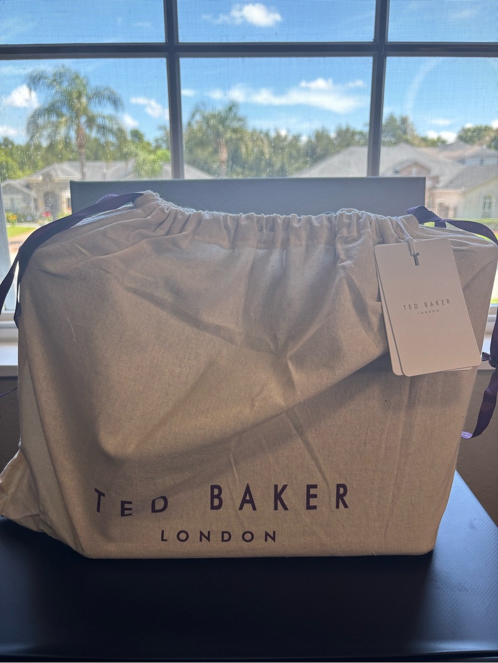Ted Baker Men's Bag with Cream Dust Cover and Purple Accents